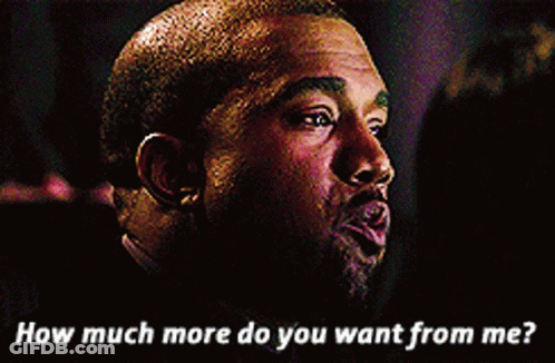 A Man Wearing A Purple Jacket With A Mamba Logo On The Front GIF