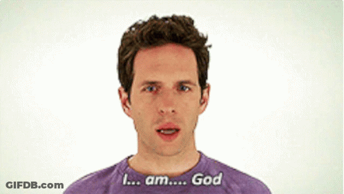 A Man Wearing A Purple Shirt That Says I Am God GIF