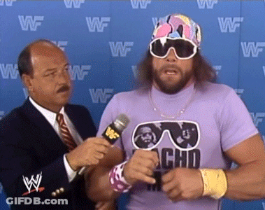 A Man Wearing A Purple Shirt That Says Macho Man GIF