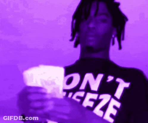 A Man Wearing A Purple Shirt That Says ' On 'T Ice2e ' GIF