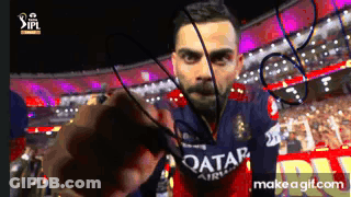 A Man Wearing A Qatar Airlines Jersey Holds A Rope In His Hand GIF