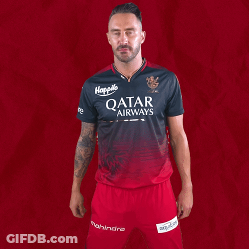A Man Wearing A Qatar Airways Shirt And Shorts GIF