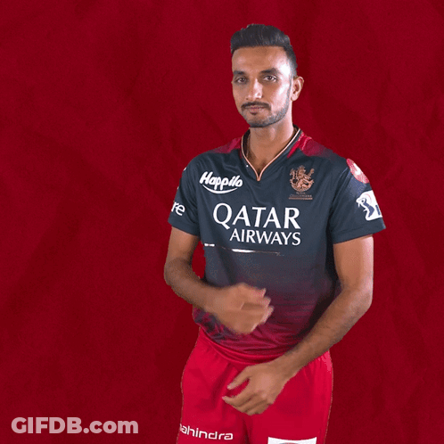 A Man Wearing A Qatar Airways Shirt Holds His Hands Together GIF