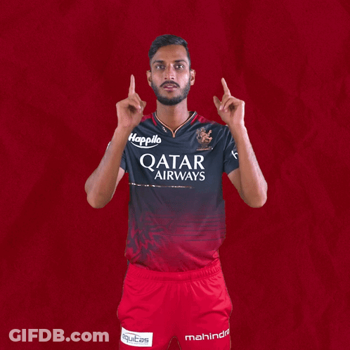 A Man Wearing A Qatar Airways Shirt Holds Up His Arms GIF