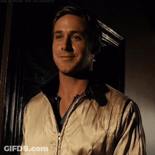 A Man Wearing A Quilted Jacket Is Smiling With The Words Had A Thing For Astronauts Below Him GIF