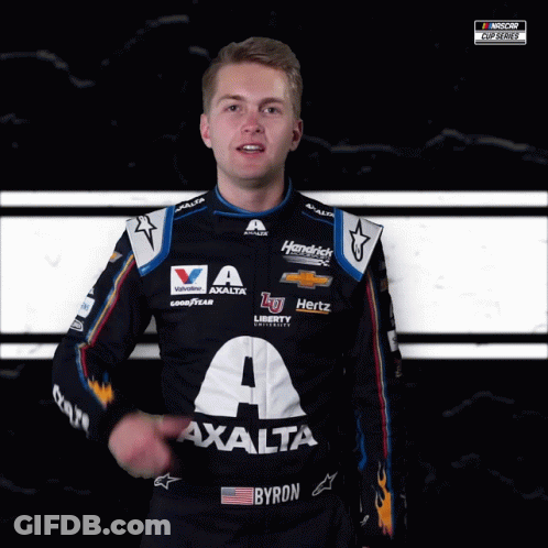A Man Wearing A Racing Suit That Says Byron On It GIF