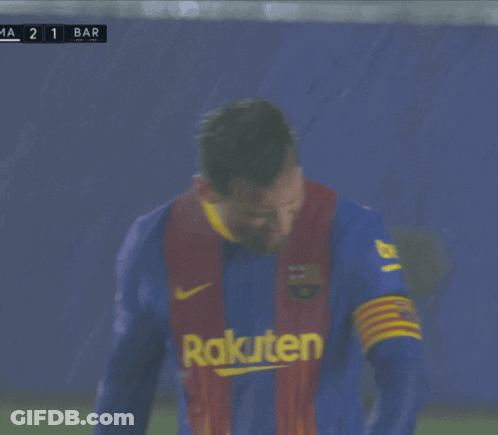 A Man Wearing A Rakuten Jersey Is Laughing GIF