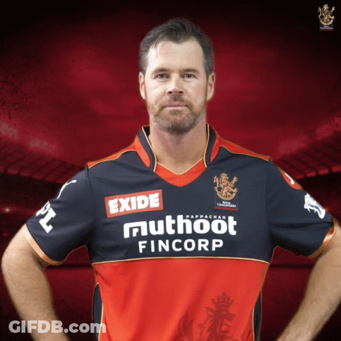 A Man Wearing A Red And Black Jersey With Exide And Muthoot Fincorp On It GIF