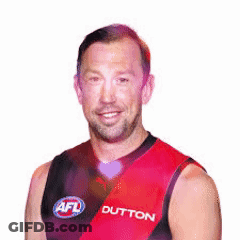 A Man Wearing A Red And Black Tank Top That Says Dutton On It GIF