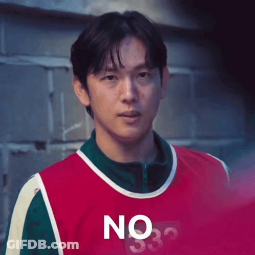 A Man Wearing A Red And Green Shirt With The Number 332 On It GIF