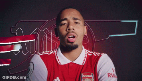 A Man Wearing A Red And White Arsenal Jersey Says I Am GIF