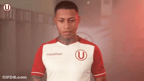A Man Wearing A Red And White Marathon Shirt GIF