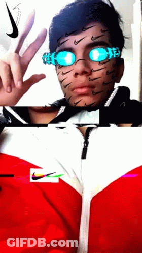 A Man Wearing A Red And White Nike Jacket And Sunglasses GIF