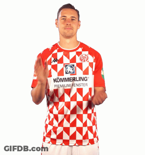 A Man Wearing A Red And White Shirt That Says Kommerling Premium Fenster On It GIF