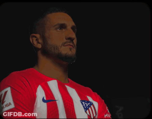 A Man Wearing A Red And White Striped Shirt That Says Laliga On The Sleeve GIF