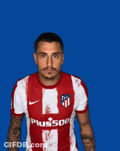 A Man Wearing A Red And White Striped Shirt With A Hyundai Logo On It GIF