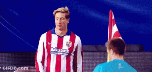 A Man Wearing A Red And White Striped Shirt With Baku 2015 On It GIF