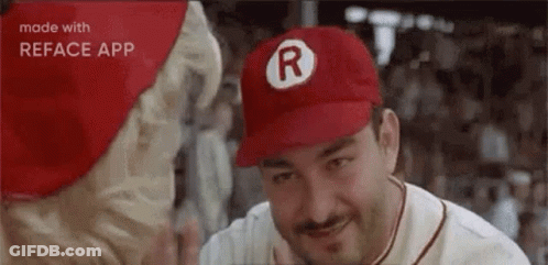 Man In Red Baseball Cap Smiling At Woman GIF