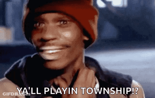 A Man Wearing A Red Beanie Is Smiling And Says `` Ya 'Ll Playin Township ? '' GIF