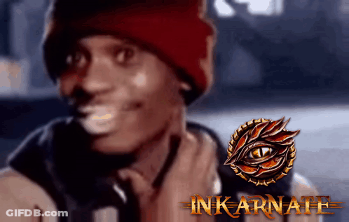 A Man Wearing A Red Beanie Is Smiling Next To A Logo That Says Inkarnate GIF