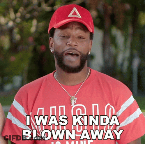 A Man Wearing A Red Hat And A Red Shirt Says I Was Kinda Blown Away GIF