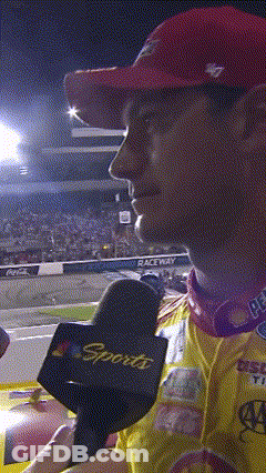 A Man Wearing A Red Hat And A Sports Microphone GIF