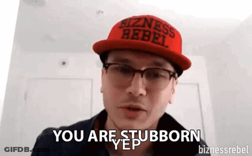 A Man Wearing A Red Hat And Glasses Says `` You Are Stubborn '' . GIF
