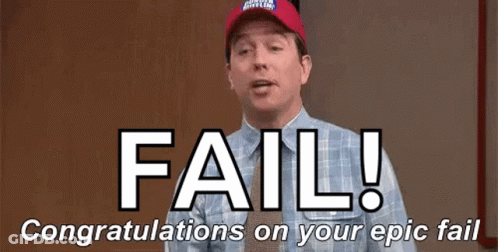 A Man Wearing A Red Hat Is Standing In Front Of A Sign That Says Fail ! GIF