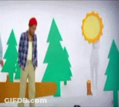 A Man Wearing A Red Hat Stands In Front Of A Wall With Trees And A Sun GIF