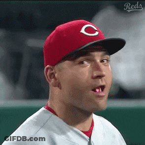 A Man Wearing A Red Hat With A White C On It GIF