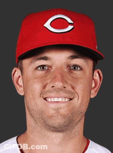 A Man Wearing A Red Hat With The Letter C On It Smiles GIF