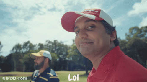 A Man Wearing A Red Hat With The Word Lol On The Bottom GIF