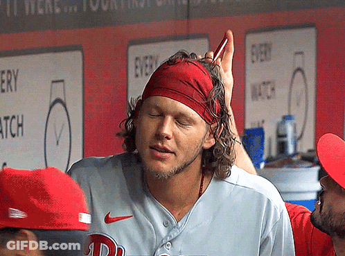 A Man Wearing A Red Headband And A Nike Jersey GIF