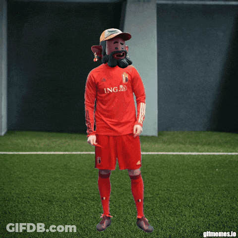 A Man Wearing A Red Ing Jersey Is Dancing On A Soccer Field GIF