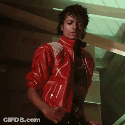 A Man Wearing A Red Jacket And A T-Shirt That Says Amour GIF