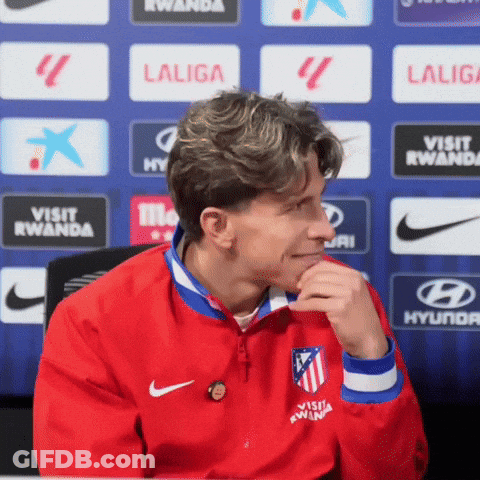 A Man Wearing A Red Jacket With The Word Laliga On It GIF