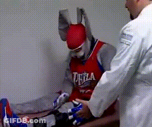 A Man Wearing A Red Jersey That Says Philadelphia On It GIF