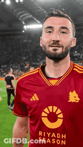 A Man Wearing A Red Jersey That Says Riyadh Season On It GIF