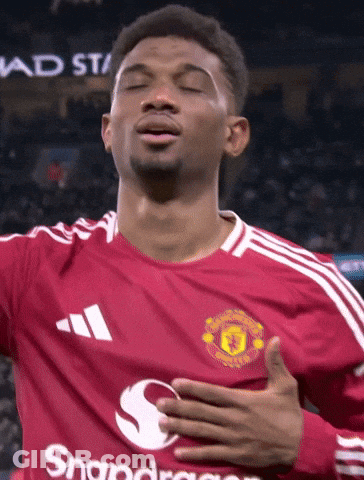 A Man Wearing A Red Jersey With Snapdragon On The Front GIF