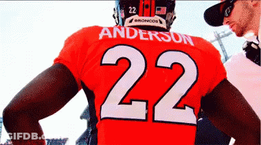 A Man Wearing A Red Jersey With The Name Anderson On It GIF