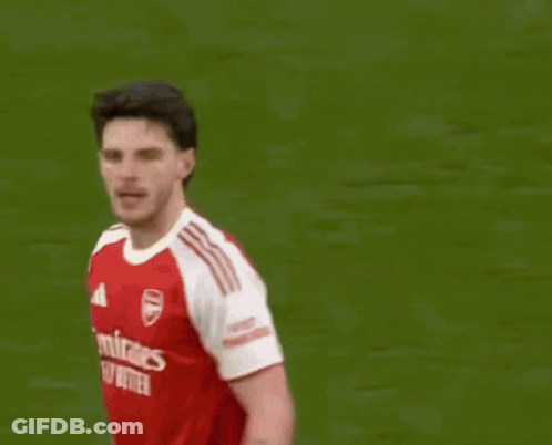 A Man Wearing A Red Jersey With The Number 41 On It GIF