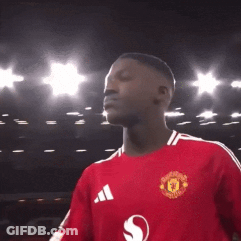 A Man Wearing A Red Manchester United Shirt GIF