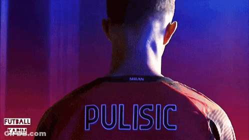 A Man Wearing A Red Milan Shirt With The Name Pulisic On The Back GIF