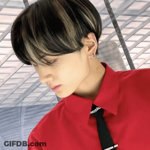 A Man Wearing A Red Shirt And A Black Tie GIF
