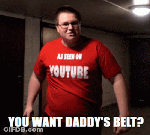 A Man Wearing A Red Shirt That Says " As Seen On Youtube You Want Daddy 'S Belt " GIF