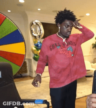 A Man Wearing A Red Shirt That Says Grasshoppers On It GIF