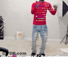 A Man Wearing A Red Shirt That Says Illuminati GIF