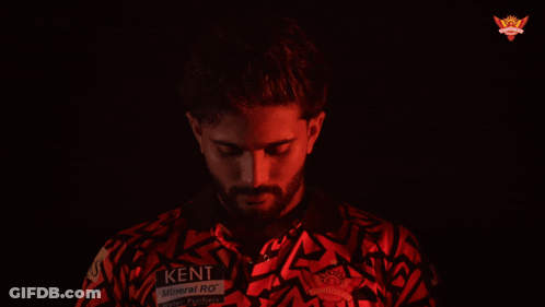 A Man Wearing A Red Shirt That Says Ken GIF