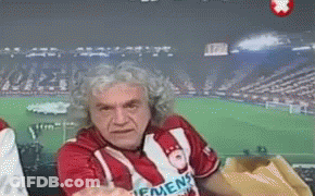A Man Wearing A Red Shirt That Says Men 'S Soccer On It GIF