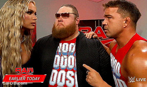 A Man Wearing A Red Shirt That Says No Duo Dos Is Standing Next To Two Other Men GIF